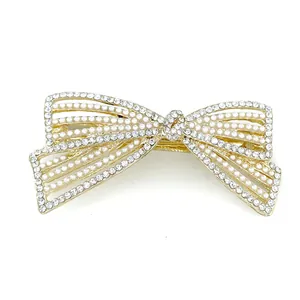 Elegante fermaglio per capelli a fiocco dorato con perle bianche e cristalli per donna