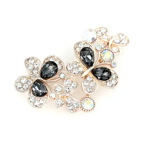 Elegant butterfly crystal brooch with black teardrop stones and rhinestones for suits