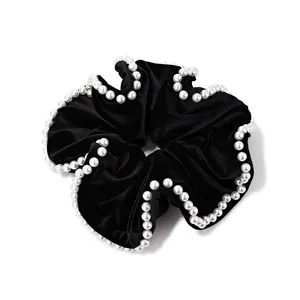Elegant black velvet scrunchie with white pearl trim and pleated vintage design