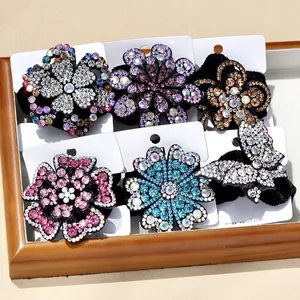 Set di elastici per capelli in velluto con fiori di strass e decori a farfalla