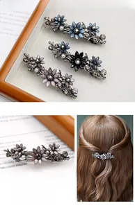 Detail einer Vintage-Blumen-Haarklammer mit Kristall-Strasssteinen und Kunstperlen