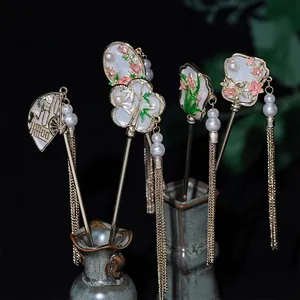 Elegant Chinese hair pins set with white jade texture fan flowers and gold tassels