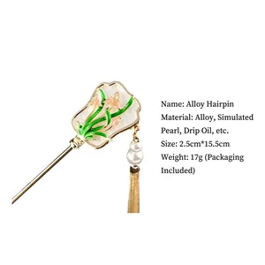 Elegant Chinese style fan hair stick with white enamel floral details and tassels