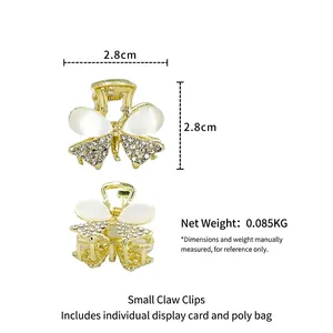 Exquisite 2,8cm goldene Schmetterling Haarklammer mit Strass und weißen Harzflügeln