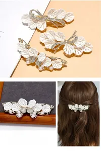 Detailed set of three elegant ivory leaf hair clips with rhinestones and pearls
