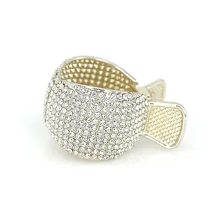 Elegant gold metal round hair claw clip with sparkling rhinestones for high ponytails