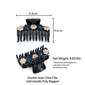 Elegant black acrylic double hair claw clip with blue and champagne rhinestone flowers