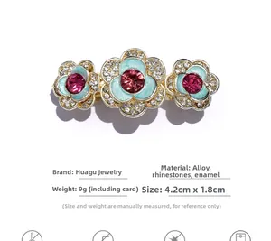 Detailed view of rhinestone hair clip showing dimensions 4.2cm x 1.8cm and alloy material