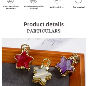 Detail of star-shaped acetate hair clips in red, cream, and purple on a wood tray