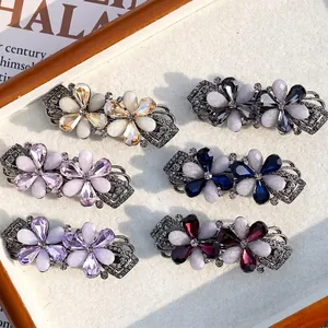Eleganti fermagli per capelli a fiori con petali di cristallo e perle opali in sei colori