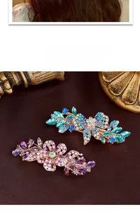 Detail shot of elegant floral spring hair clips with sparkling crystals in two vibrant colors