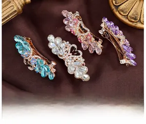 Set of four luxury rhinestone heart hair clips in blue, white, pink and purple