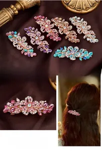Macro detail of rhinestone floral hair clips with sparkling crystals and alloy base