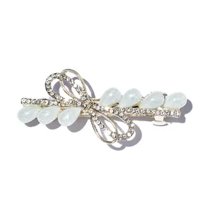 Barrette à cheveux nœud en alliage doré avec gemmes bleues et strass étincelants
