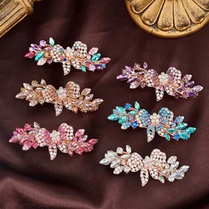 Elegant rose gold butterfly hair clips set with colorful rhinestones in a six-piece set