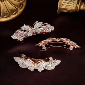 Set aus drei Schmetterling-Haarspangen mit Roségold-Beschichtung und rosa Kristallen