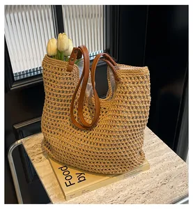 Macro detail of hand-woven mesh tote with premium dark brown leather handles and inner lining