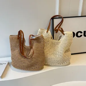 Handmade woven cotton rope tote bags in khaki and beige with leather straps for beach