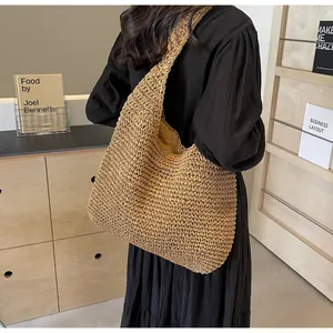 Detail of handwoven paper rope tote bag showing texture and large capacity fit