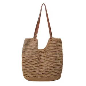 Handmade woven cotton rope tote bag with hollow mesh design for summer beach outings