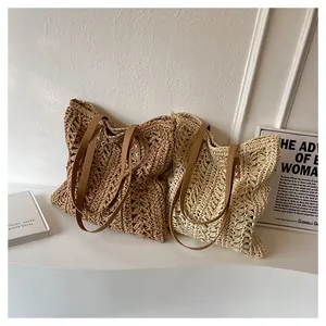 Close-up of hollow woven texture and premium leather straps on the summer tote bag