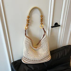 Women's Hollow Out Woven Straw Tote Bag Bohemian Beach Vacation Shoulder Bag With Wood Bead Strap PU Leather Trim Handbag