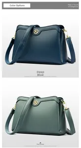 Detail of dark blue and green leather handbags with wavy flap and gold XG logo