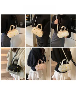 Detailed views of vintage Boston bag with gold rivets in four elegant colors