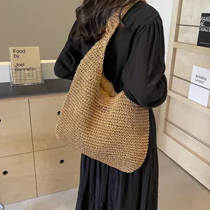 Large capacity woven straw hobo bag in natural khaki with a vintage handmade finish