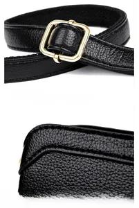 Detail of black lychee leather bag featuring adjustable strap and golden metal buckle