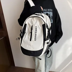 Sac à dos bicolore noir et blanc minimaliste avec bretelles réglables et poches filet
