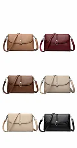 Detail view of large capacity handbags showing six colors with lychee texture and metal buckle