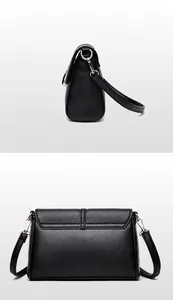 Close-up of black lychee grain leather handbag showing side and back detail views
