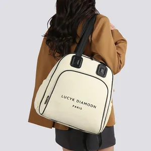 Großer cremefarbener multifunktionaler Rucksack und Tragetasche mit schwarzem Gurtband