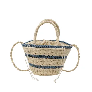 Sac seau en paille tissée avec rayures bleues, doublure à cordon et poignées d'été
