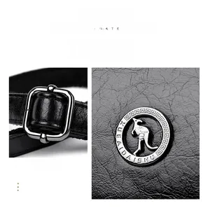 Detail of silver square buckle and kangaroo logo on black pebbled leather handbag