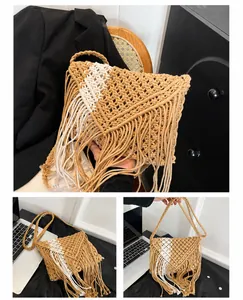 Detail view of khaki Bohemian Macrame woven bag with tassel and adjustable strap