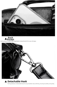 Detail of the back zipper pocket and detachable metal hooks on the black leather handbag