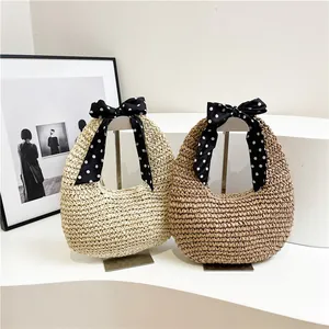 Handmade woven straw handbags in beige and brown with chic polka dot ribbon silk scarves