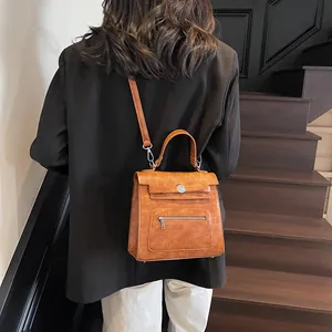 Vintage brown leather crossbody bag with silver buckle and removable strap for women