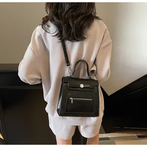 Fashionable black crossbody bag shown from behind to highlight styling and daily wear proportions