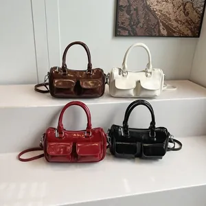 Minimalist oil wax leather Boston handbags in brown, white, red, and black with strap
