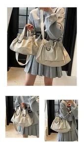 Detail view of beige canvas tote bags with drawstring closure and adjustable shoulder straps