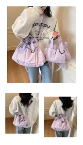 Detail showing two sizes of lavender nylon tote bags with shoulder straps and D-ring