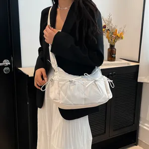 Sac à bandoulière blanc en nylon avec nœud coulissant et grande capacité pour l'école