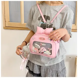 Detailed view of pink sweet Lolita Ita bag with transparent window and ribbon bow