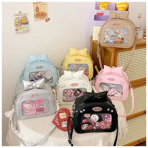 Detail view of the clear display window and large bow on these sweet Ita-bags