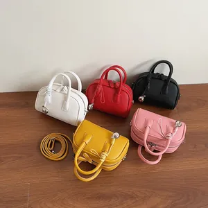 Litchi pattern leather handbags in five colors with adjustable shoulder straps