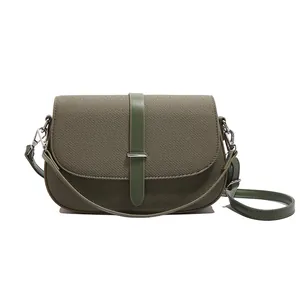 Olive green crossbody bag with twill fabric texture and silver metal clasp detail