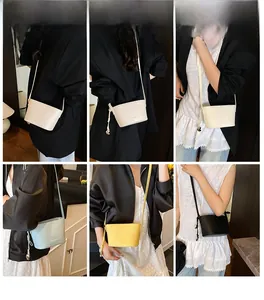Détail des mini sacs seaux en cuir déclinés en blanc, bleu, jaune et noir élégant